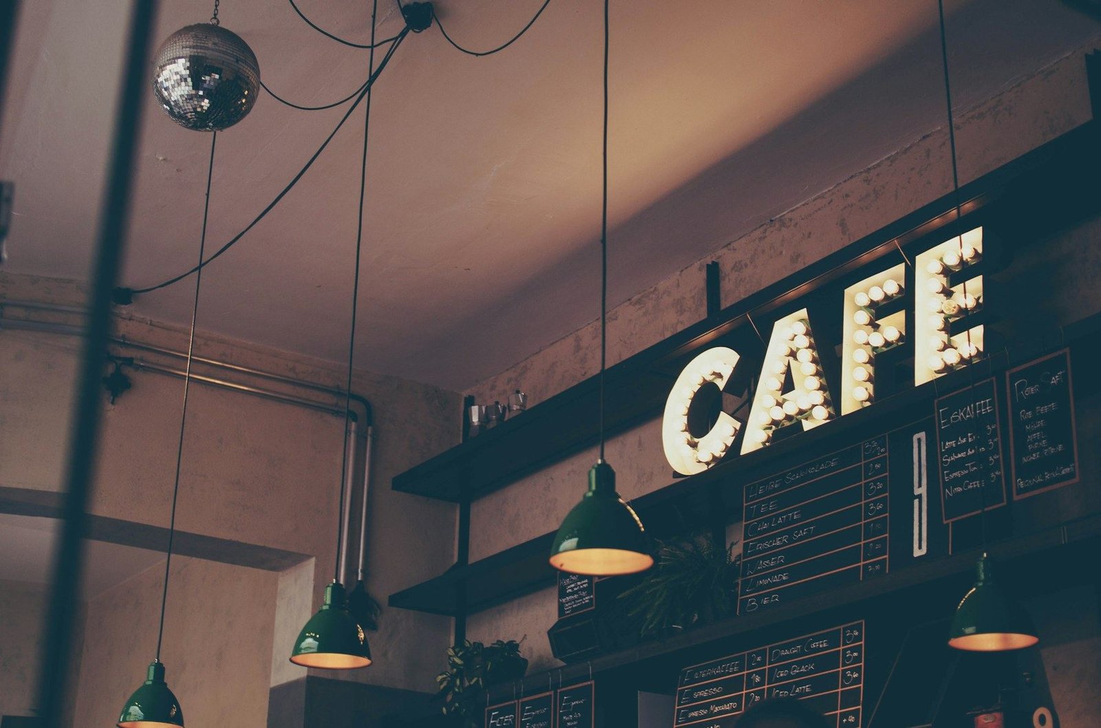 Warm café interior with timber tables and soft lighting