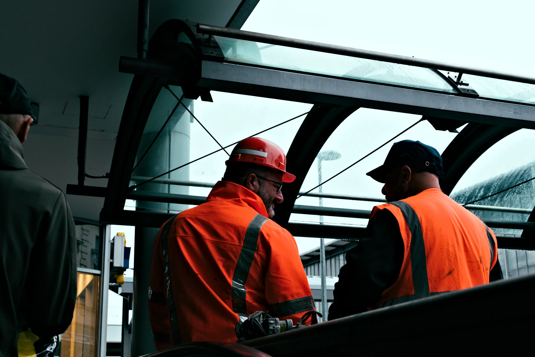 Two construction professionals discussing work on site